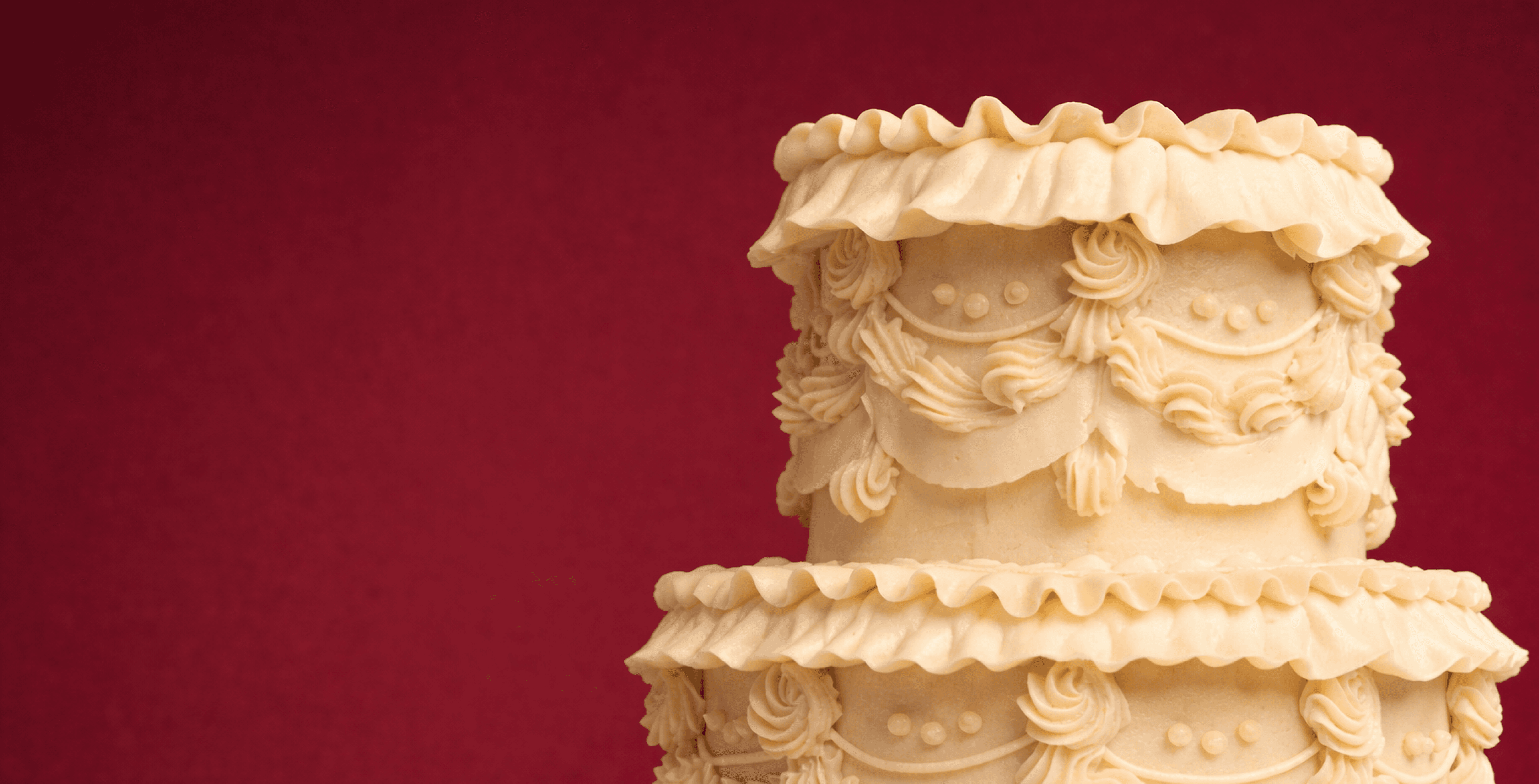 Ornate tiered buttercream cake